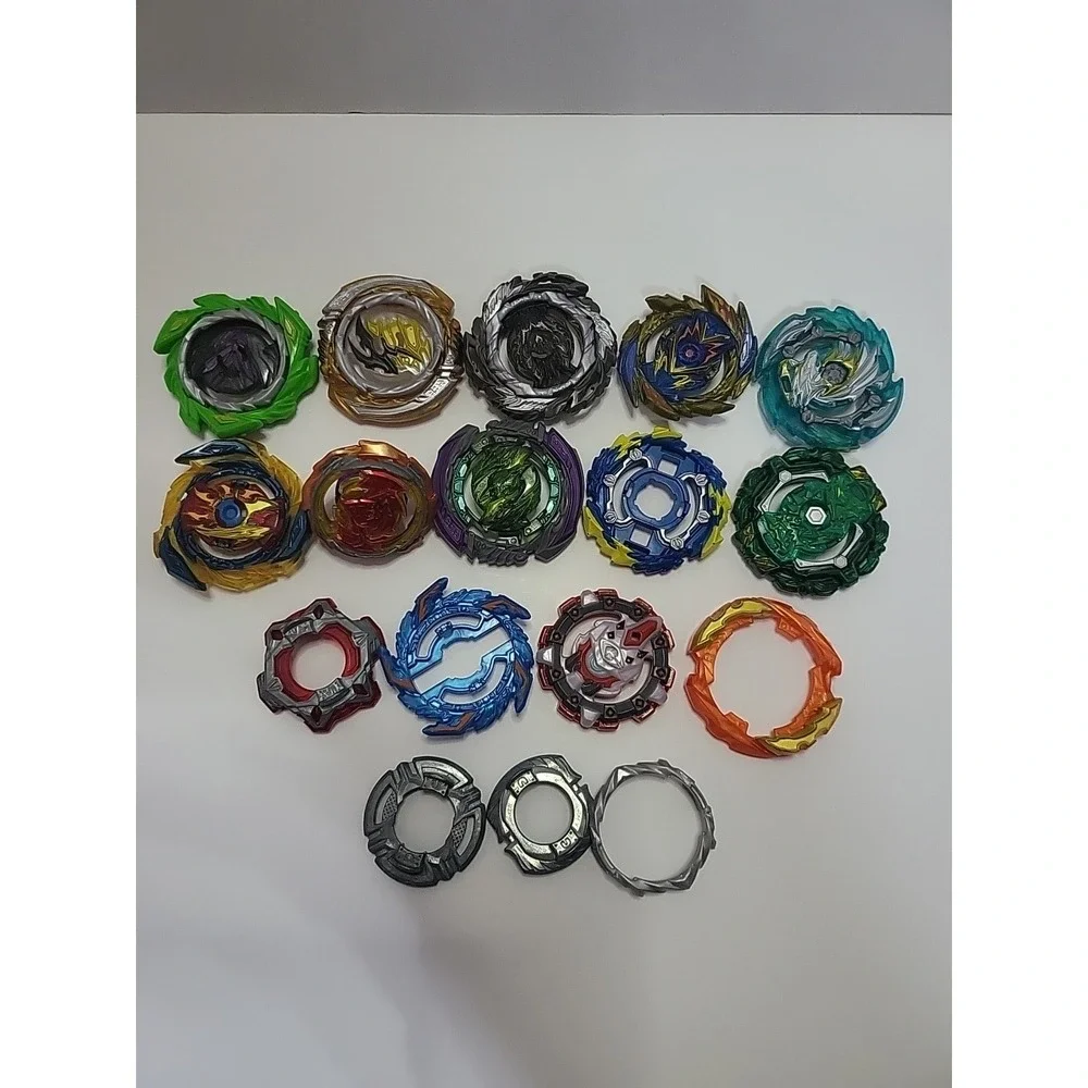 Lot of mixed Beyblade misc parts, bey top pieces and other as‎ seen